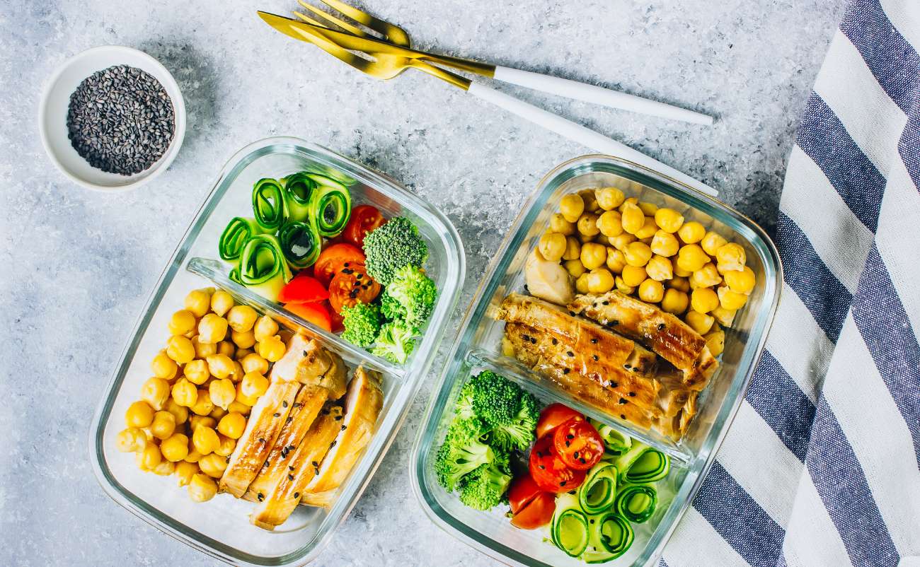 Meal Prep Planning containers with spoon and Beans