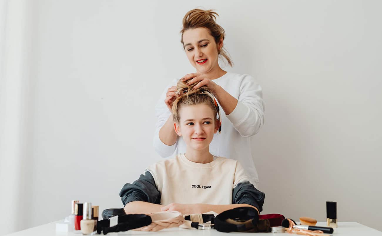 Young girl getting some secrets guide to achieving Healthy and Strong Hair at home