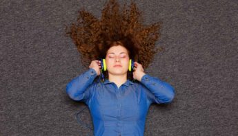 Women listening music to reduce and relieve stress