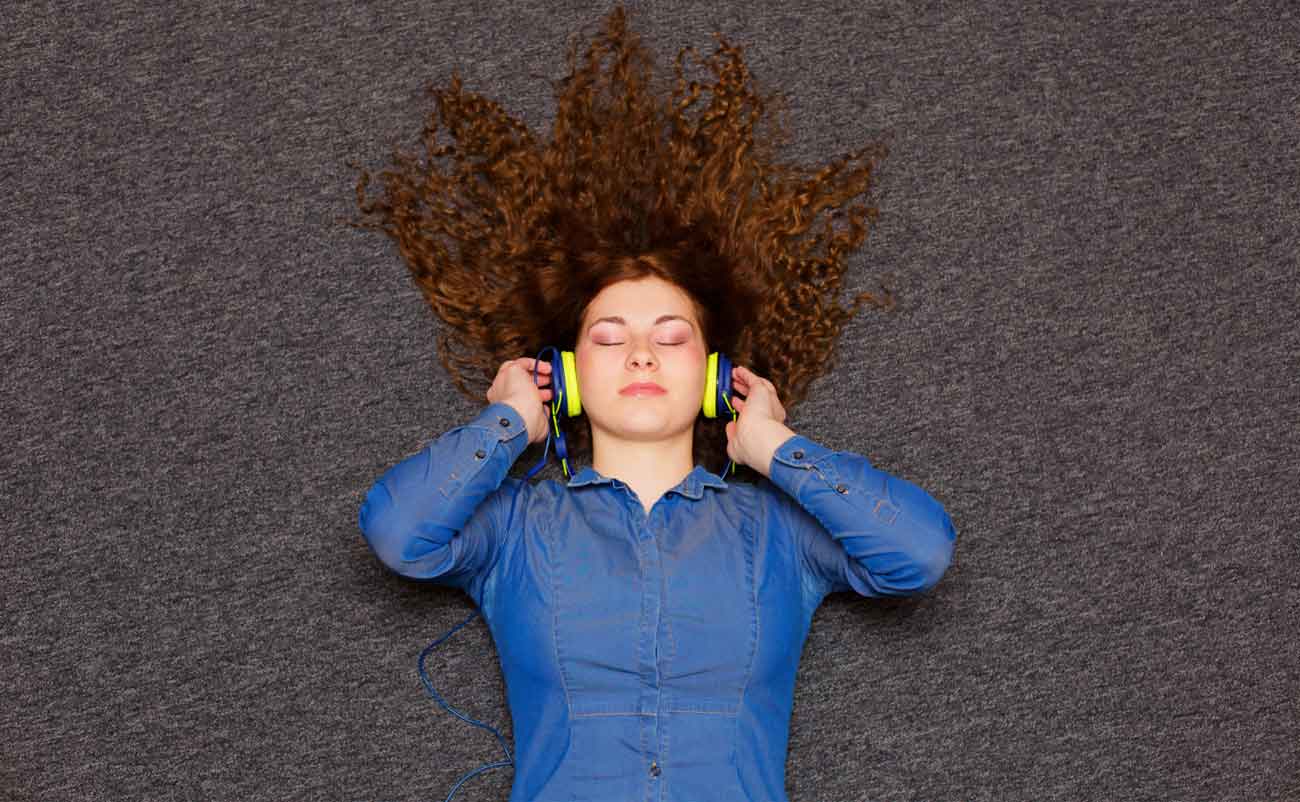 Women listening music to reduce and relieve stress