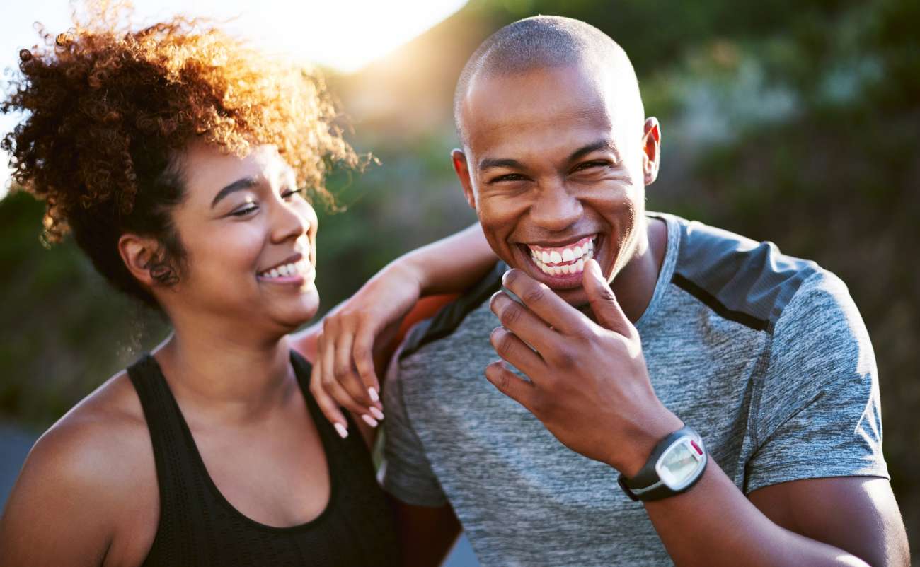 couple laughing together showing their positive relationship