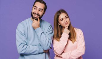 couple smiling thinking positive