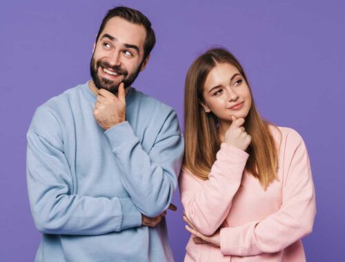 couple smiling thinking positive