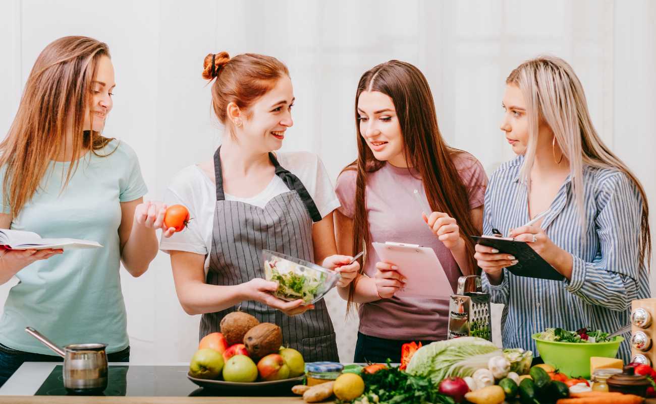 girls calculating diet meal calories for personal healthy lifestyle