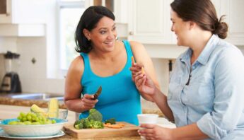 women checking healthy vegetables