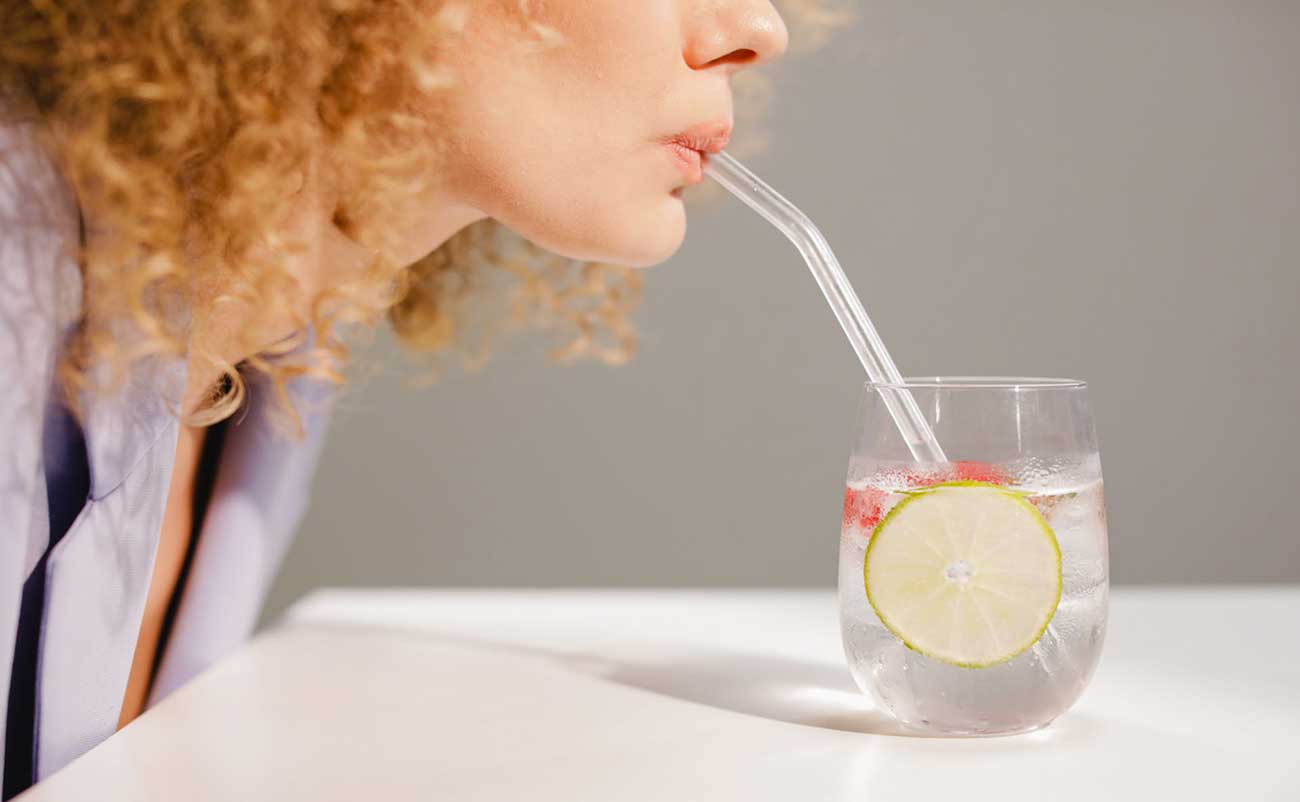 women drinking alkaline water in morning routine