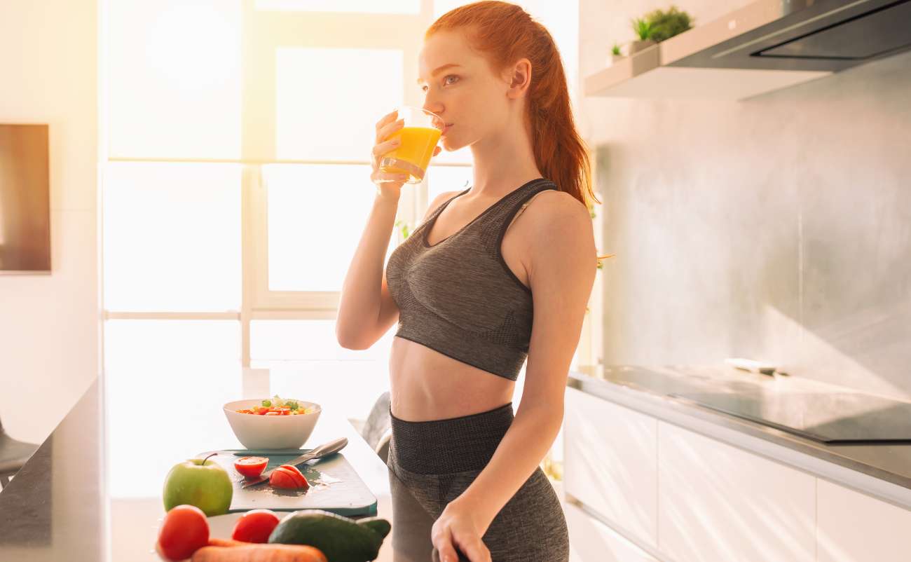 women drinking healthy juice at home