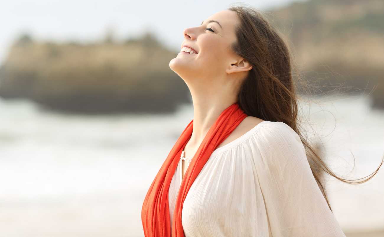 women enjoying morning weather on the beach