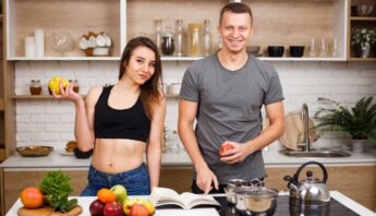 young couple preparing healthy meal at home