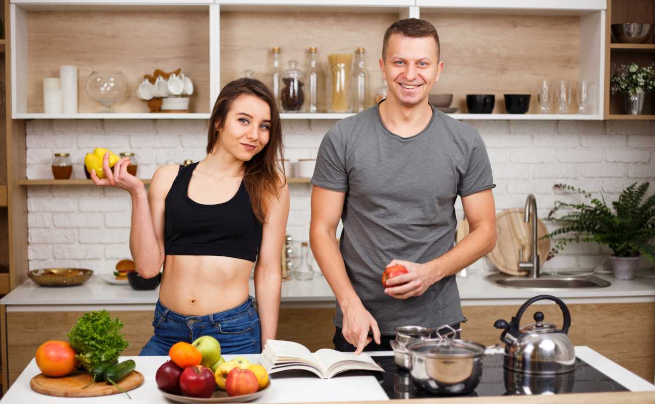 young couple preparing healthy meal at home